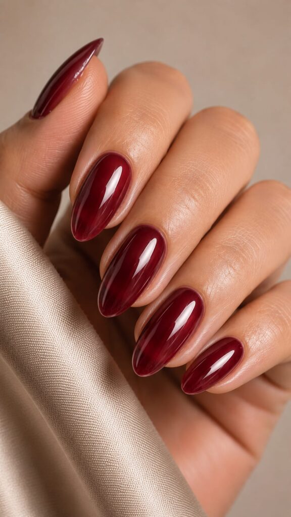 Uñas borgoña vino brillante tendencias uñas verano 2026
